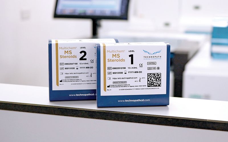 Multichem MS Steroids kit box in laboratory with analyzer in the background